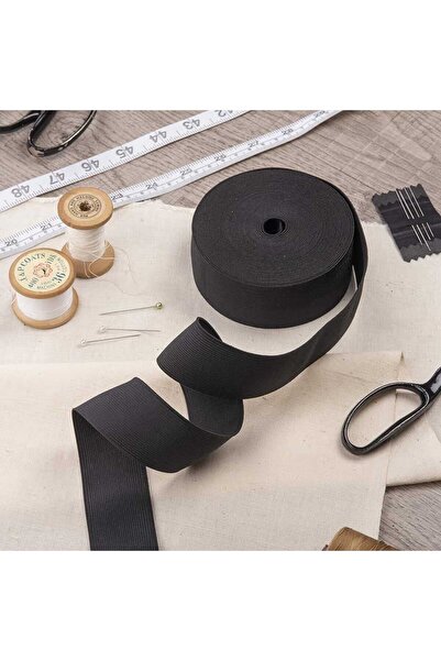 nat Wide black elastic band used mainly in sewing and handicrafts.