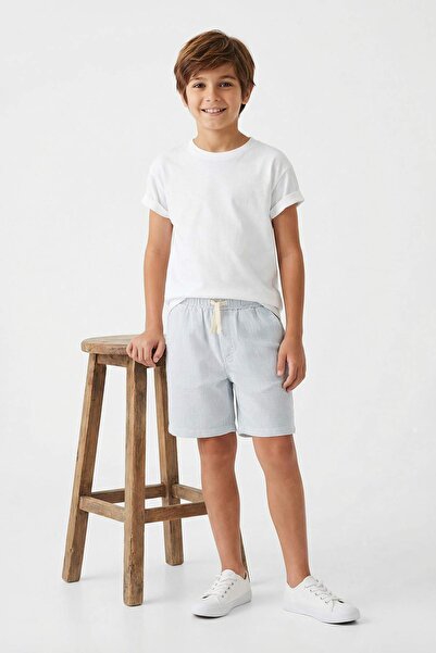 TRENDYOLKIDS Babyblaue, einfarbig gewebte Musselin-Shorts und Bermuda-Hose fü...