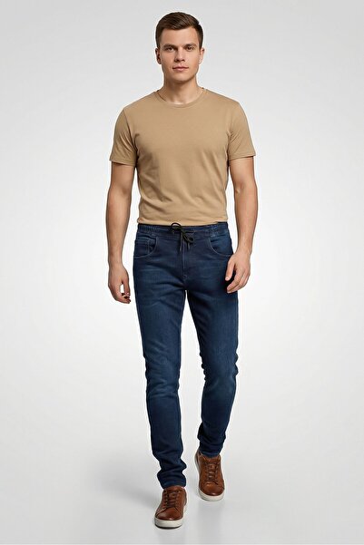 Replay بنطلون جينز رجالي مغسول وقابل للتمدد بقصّة عادية، أزرق غامق