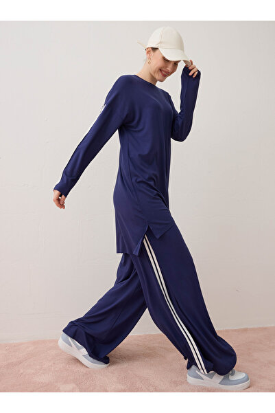 Benin طقم مكون من قطعتين من التونيك الطويل والسروال مع شريط جانبي من القماش ا...