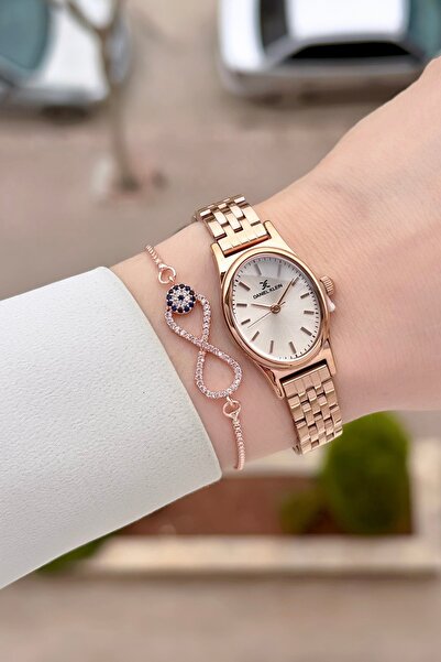 Daniel Klein ساعة يد نسائية بسوار قابل للتعديل بلون وردي