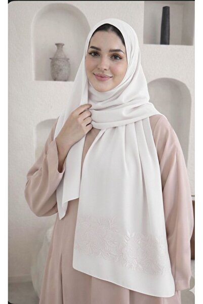 Veil Designer A white, embroidered headscarf with Japanese roses on both side...