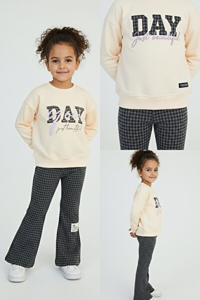 zubi baby & kids wear طقم بناتي يتكون من سترة مطبوعة بلون البيج وبنطلون منقوش