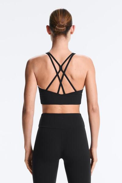 Oysho حمالة صدر رياضية متوسطة الدعم من Comfortlux مع أكواب