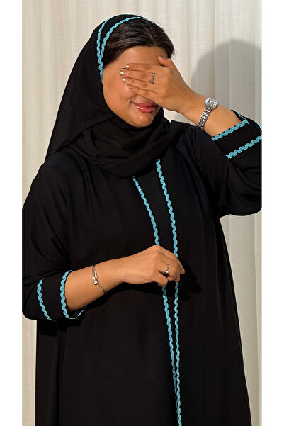 Ms Royal black summer abaya with a half-circle cut and light blue trim on the...