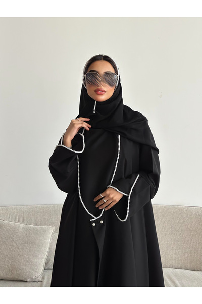 outline Black Eid abaya embroidered with pearls, with a connected dress design.
