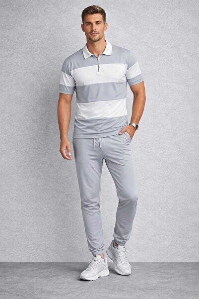 BRLKN طقم رياضي رجالي مخطط كبير الحجم مع سترة نصف سحابية وبنطلون مطاطي عند ال...