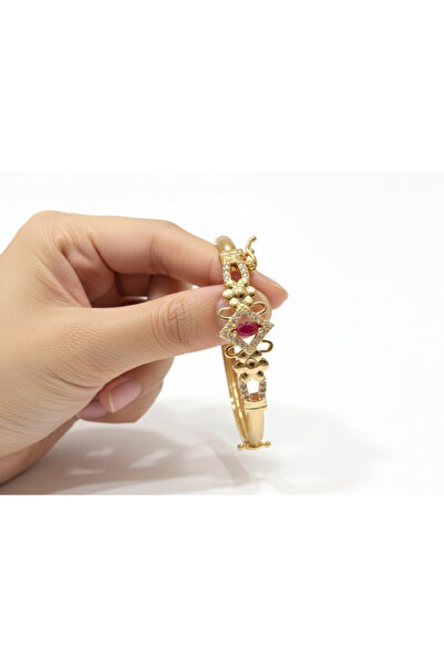 burjalmodah A luxurious gold bracelet studded with crystal and red stone - th...