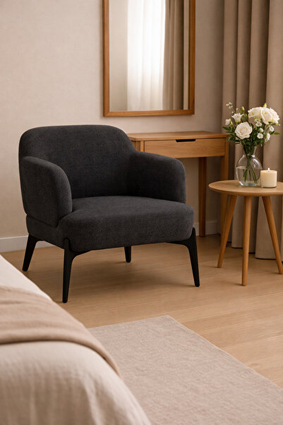 N.zone A luxurious recliner chair with dark gray fabric upholstery and black ...