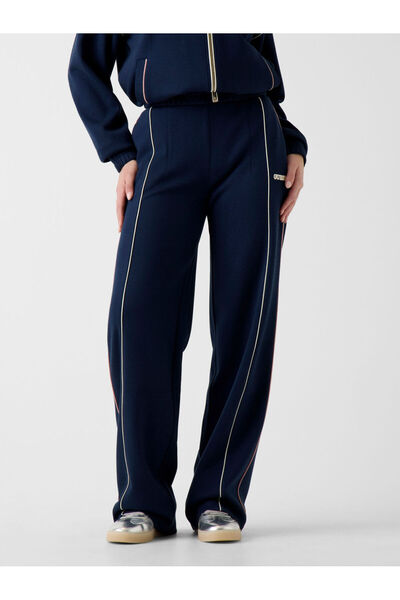 Guess بنطال قصة ساق واسعة