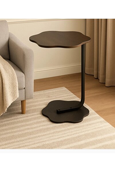 Modern shop A stylish and modern side table with a rose-shaped top, perfect f...