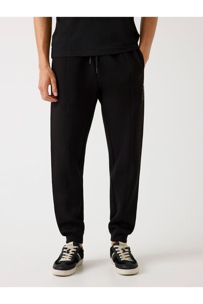 Guess بنطال رياضي بشعار جانبي