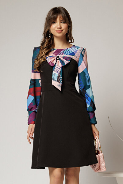 DyFashion Andrada dress made of black fabric with bow and colorful blue print...