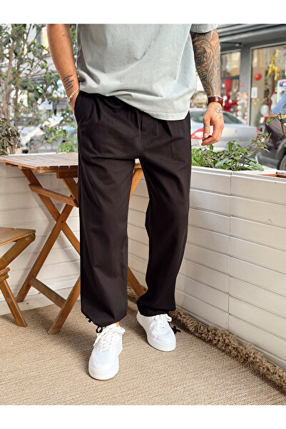 manch collection Παντελόνι Γαμπαρντίνα με δεμένα μανσέτες σε μαύρο χρώμα