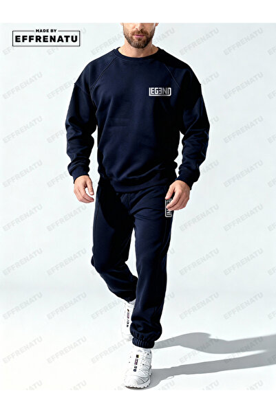 EFFRENATU The Hoodless, Navy Blue Tracksuit Is Designed with Original Prints.