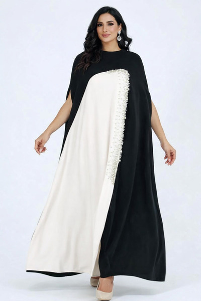 Elegant A black and white crepe jalabiya decorated with crystals and pearls