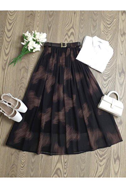 ŞAHİN TESETTÜR GİYİM DALGALI DESENLİ DERİ KEMERLİ BELİ LASTİKLİ ASTARLI ŞİFON...