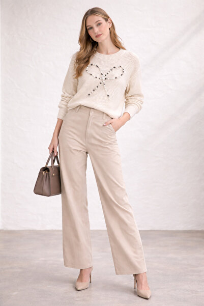 Noa&Noa سترة مخرمة بتفاصيل من اللؤلؤ الأسود والأبيض