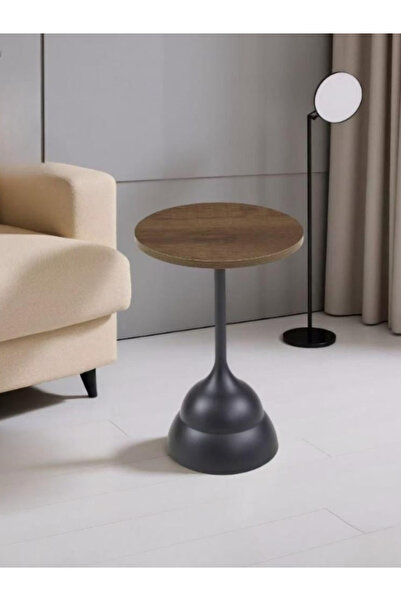 BEC30 A round serving table with a unique, streamlined design