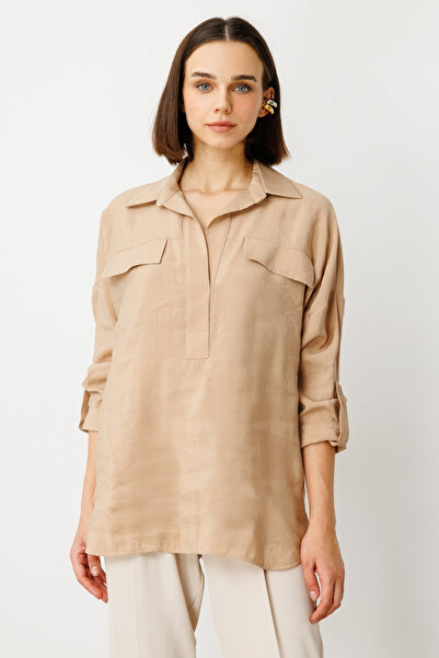 ON Μινιμαλιστική γυναικεία μπλούζα με λεπτομέρεια τσέπης oversized 3/4 μανίκι...