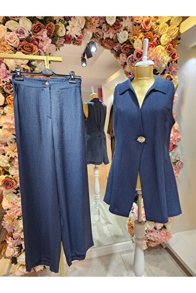 Kayra kadın koyu lacivert gömlek yaka düğme detaylı yelekli takım