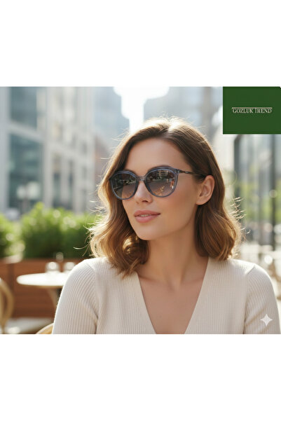 Vogue 5647SI 30414L 53 Şeffaf koyu mavi Kadın Güneş Gözlüğü