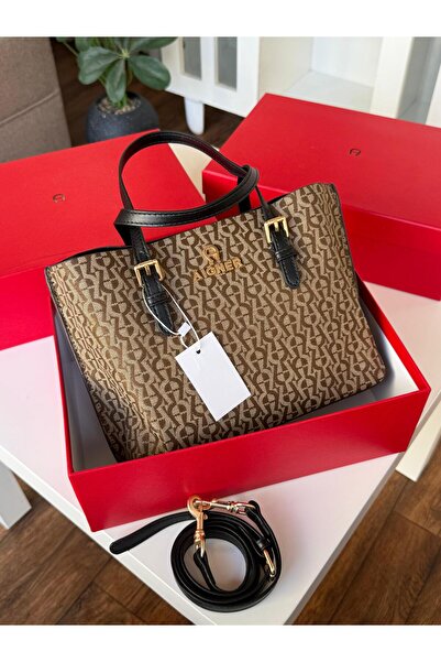 GENERAL A women's handbag with a classic, elegant design and a distinctive pr...