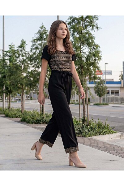 REDTAG جمبسوت أسود بنقشة زهور للبنات الكبيرات