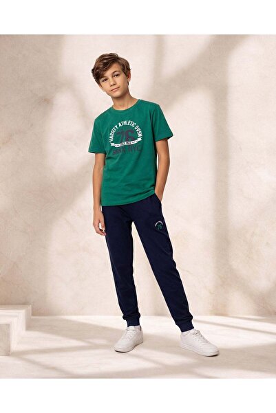 REDTAG طقم بيجاما أخضر للأولاد الكبار من ماركة Varsity 76