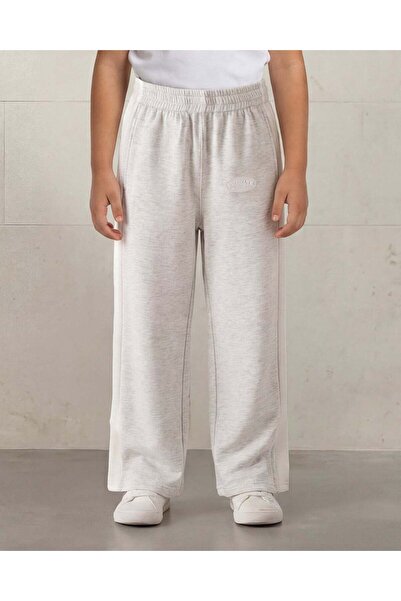 REDTAG Girls Grey Melange Rubber Badge Cut & Sew Scuba Track Pants