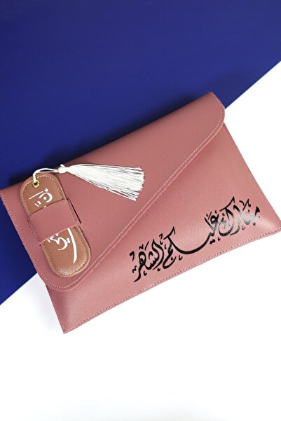 casing A Mini Bag (clutch) in a matte pink color, with the phrase "Blessed mo...