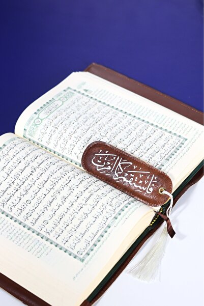 casing A brown leather bookmark with the phrase "So be upright as you have be...