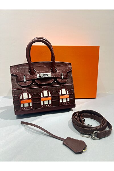 GC A luxurious Clutch Bag with a bold architectural design – a style that com...