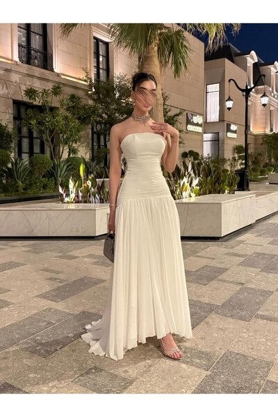 DVNA "Serene" white chiffon dress with a low waist and off-white draped design