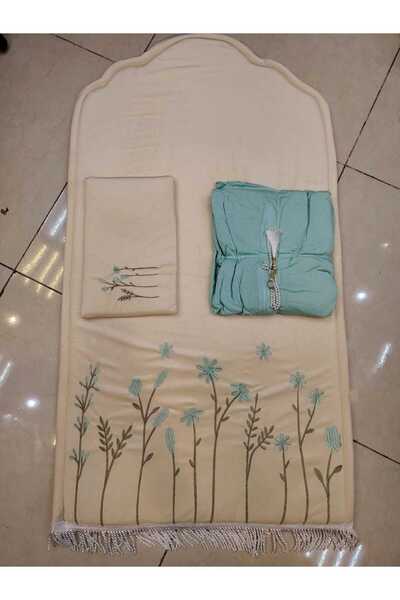 RUG A distinctive prayer set with a turquoise embroidered prayer rug and a pr...