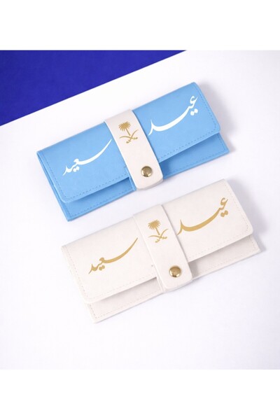 GIFT محفظة نسائية جلد بتصميم وطني أنيق – سيفين ونخلة مع اسم مميز – لون ازرق و...