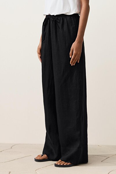 Oysho 100% linen straight-leg trousers with seam detail