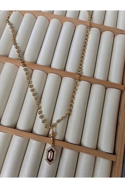 ARİ TAKI قلادة من الفولاذ على شكل سداسي بلون القهوة من دوريكا