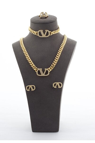 Un A delicate women's stainless steel accessory set adorned with elegant zirc...