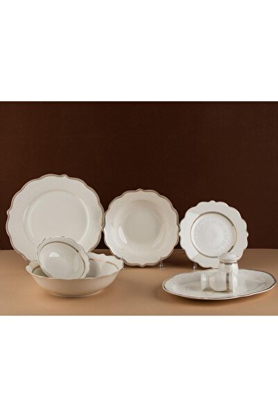 TOHFAT-AL MAIDAH A luxurious dinnerware set consisting of 28 pieces of fine p...