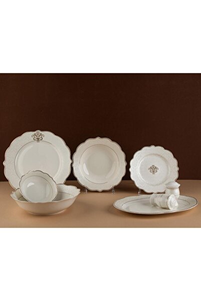 TOHFAT-AL MAIDAH A luxurious dinnerware set consisting of 28 pieces of fine p...