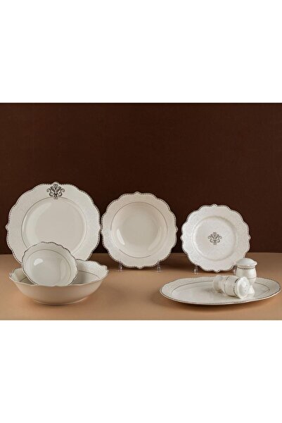 TOHFAT-AL MAIDAH A luxurious dinnerware set consisting of 28 pieces of fine p...