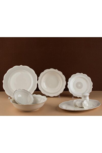TOHFAT-AL MAIDAH A luxurious dinnerware set consisting of 28 pieces of fine p...