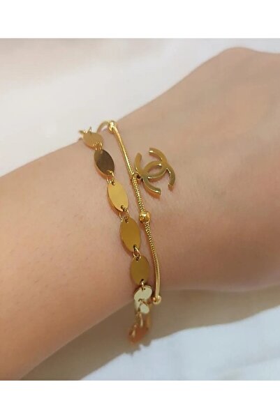 burjalmodah A gold bracelet with an elegant design and a touch of luxury