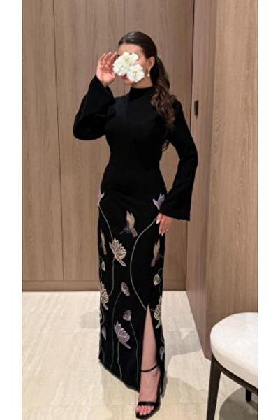 Mazoon Fashion فستان فاخر بأجنحة