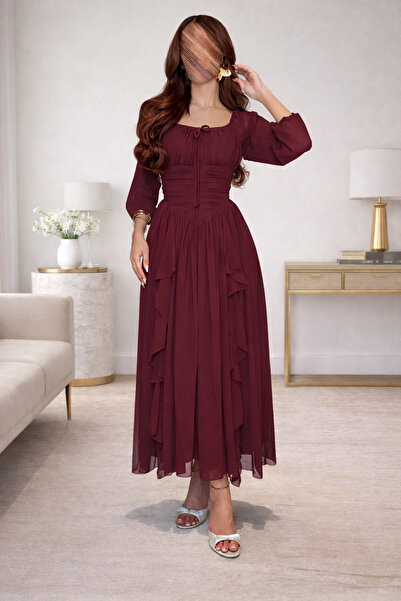 ABAS A burgundy georgette chiffon dress designed in a feminine style