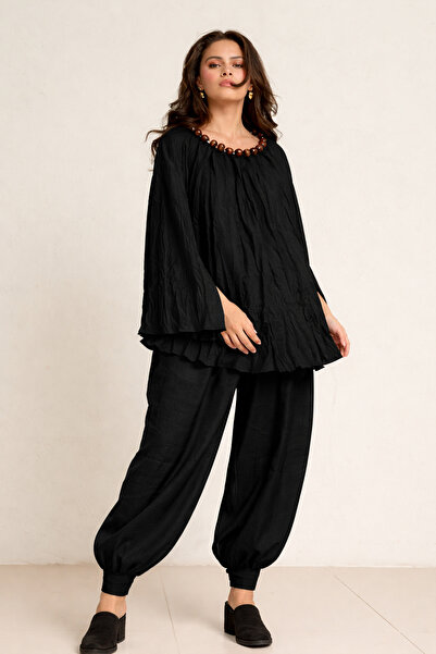 Setre Μαύρη μπλούζα με αξεσουάρ στο λαιμό, λεπτομέρεια στο μανίκι, ρευστή εφα...