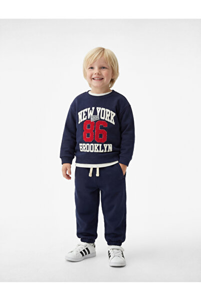 Koton Pantaloni de trening cu buzunare și șireturi în talie, cu picior elastic