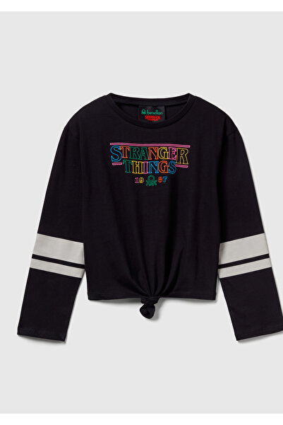 United Colors of Benetton تي شيرت بناتي أسود 100% قطن من نوع سترينجر ثينجز مز...