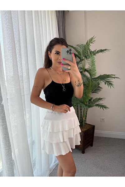 DİDEM GÜLTAKTI تنورة قصيرة بيضاء مزينة بكشكشة للسيدات من Vinta